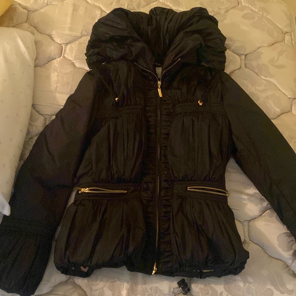 Roberto Cavalli black semi puffer. Tall chic next. Leopard hem lining.